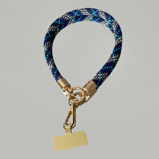 Grigri de téléphone tartan bleu